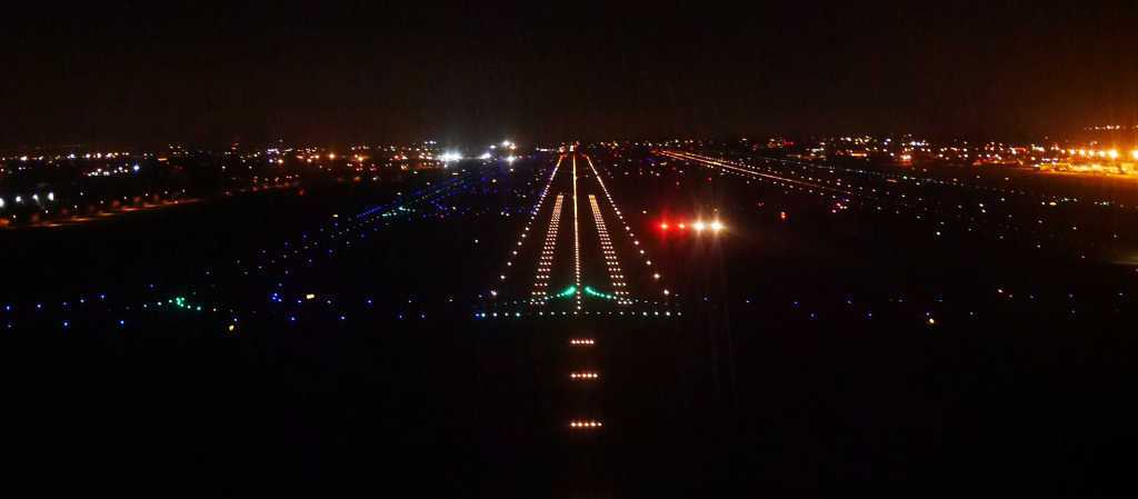 night aerial view of illuminated airstrip